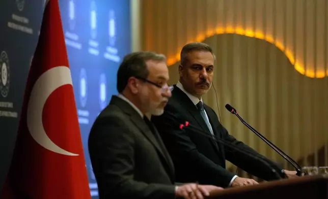 Turkish Foreign Minister Hakan Fidan, right, and his Iranian counterpart Abbas Araghchi hold a joint press conference in Istanbul, Turkey, Friday, Jan. 30, 2026. (AP Photo/Khalil Hamra)
