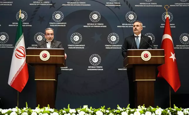 Turkish Foreign Minister Hakan Fidan, right, and his Iranian counterpart Abbas Araghchi hold a joint press conference in Istanbul, Turkey, Friday, Jan. 30, 2026. (AP Photo/Khalil Hamra)