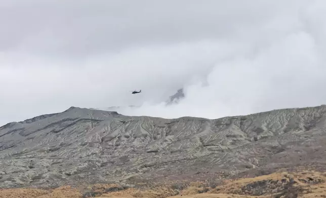 The area near the Nakadake crater of Mount Aso is seen in Kumamoto Prefecture, southwestern Japan, Tuesday, Jan. 20, 2026, where a sightseeing helicopter went missing earlier in the day. (Kodai Mitsui/Kyodo News via AP)