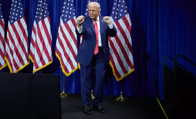 President Donald Trump dances as he walks off stage after speaking to House Republican lawmakers during their annual policy retreat, Tuesday, Jan. 6, 2026, in Washington. (AP Photo/Evan Vucci)