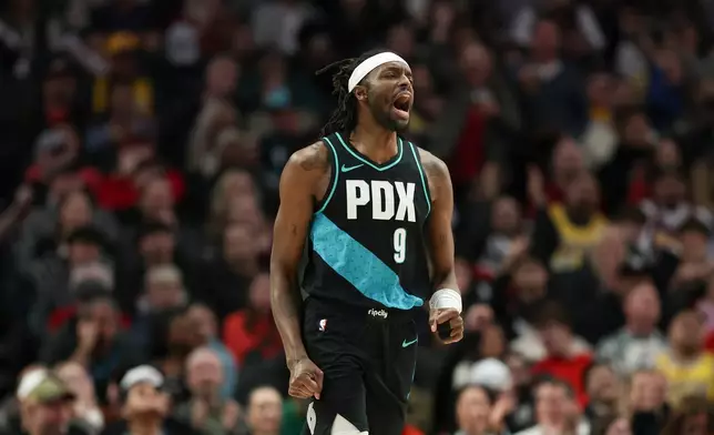 Portland Trail Blazers forward Jerami Grant reacts after a basket against the Los Angeles Lakers during the first half of an NBA basketball game Saturday, Jan. 17, 2026, in Portland, Ore. (AP Photo/Amanda Loman)