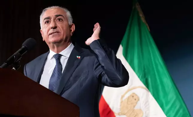 Iranian opposition leader Reza Pahlavi speaks during a news conference on Friday, Jan. 16, 2026, in Washington. (AP Photo/Mark Schiefelbein)