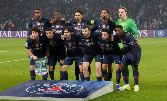 PSG squad pose before a Champions League opening phase soccer match between Paris Saint-Germain and Newcastle in Wednesday, Jan. 28, 2026. (AP Photo/Michel Euler)