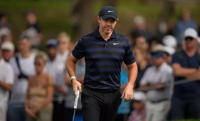 Rory McIlroy of Northern Ireland walks on the 3rd green during second round of the Dubai Desert Classic in United Arab Emirates, Friday, Jan. 23, 2026. (AP Photo/Altaf Qadri)