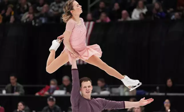 Alisa Efimova and Misha Mitrofanov compete during the pairs free skating competition at the U.S. Figure Skating Championships, Friday, Jan. 9, 2026, in St. Louis. (AP Photo/Jeff Roberson)