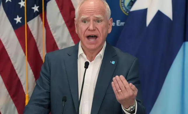 Minnesota Gov. Tim Walz speaks during a news conference in Blaine, Minn., Sunday, Jan. 25, 2026. (AP Photo/Abbie Parr)
