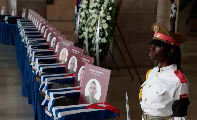 Urns containing the remains of Cuban officers, who were killed during the U.S. operation in Venezuela that captured Venezuelan President Nicolas Maduro, are displayed at the Ministry of the Revolutionary Armed Forces in Havana, Cuba, Thursday, Jan. 15, 2026. (AP Photo/Jorge Luis Banos)
