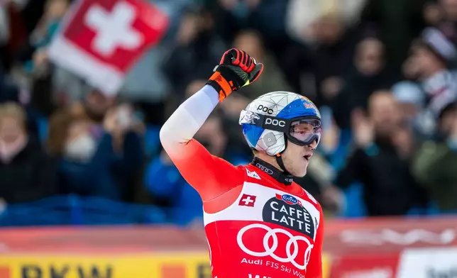 Switzerland's Marco Odermatt reacts in the finish area during an alpine ski, men's World Cup downhill race, in Wengen, Switzerland, Saturday, Jan. 17, 2026. (Peter Schneider/Keystone via AP)