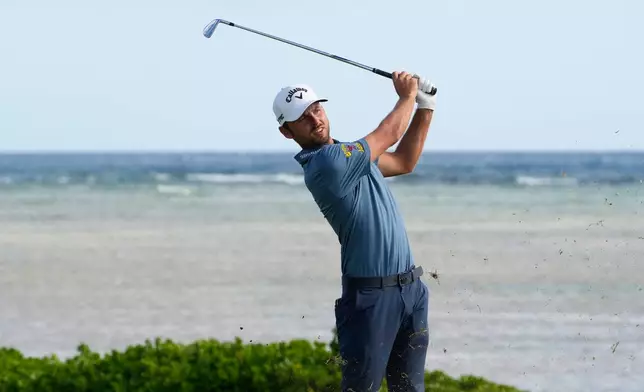 Adam Svensson, of Canada, hits from the 17th tee during the third round of the Sony Open golf event at the Waialae Country Club in Honolulu, Saturday, Jan. 17, 2026. (AP Photo/Matt York)