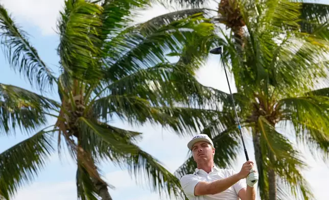 Ryan Gerard hits on the 14th hole during the third round of the Sony Open golf event at the Waialae Country Club in Honolulu, Saturday, Jan. 17, 2026. (AP Photo/Matt York)