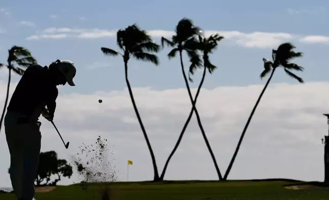 Kota Kaneko, of Japan, hits on the 16th hole during the third round of the Sony Open golf event at the Waialae Country Club in Honolulu, Saturday, Jan. 17, 2026. (AP Photo/Matt York)