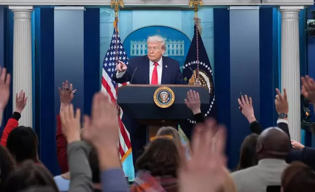 President Donald Trump speaks during a press briefing at the White House in Washington, Tuesday, Jan. 20, 2026. (AP Photo/Mark Schiefelbein)