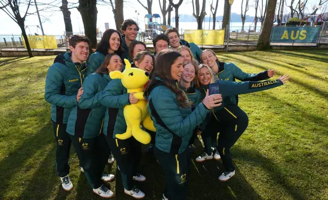 Australia's winter olympic athletes pose for photographers at the AIS European Training Centre in Gavirate, on the Varese lake, northern Italy, Monday, Jan. 26, 2026. (AP Photo/Antonio Calanni)