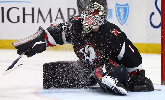 Buffalo Sabres goaltender Ukko-Pekka Luukkonen makes a save during the second period of an NHL hockey game against the Anaheim Ducks, Saturday, Jan. 10, 2026, in Buffalo, N.Y. (AP Photo/Jeffrey T. Barnes)