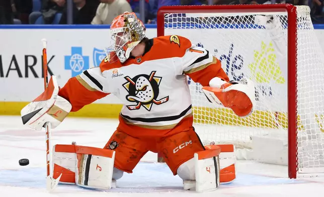 Anaheim Ducks goaltender Lukas Dostal (1) makes a pad save during the first period of an NHL hockey game against the Buffalo Sabres Saturday, Jan. 10, 2026, in Buffalo, N.Y. (AP Photo/Jeffrey T. Barnes)