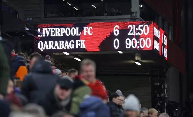 The screen shows the 6-0 result after the Champions League soccer match between Liverpool and Qarabag in Liverpool, Wednesday, Jan. 28, 2026. (AP Photo/Darren Staples)