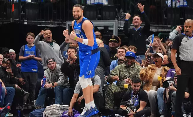 Dallas Mavericks guard Klay Thompson reacts to scoring a 3-pointer during the first half of an NBA basketball game against the Utah Jazz in Dallas, Thursday, Jan. 15, 2026. (AP Photo/LM Otero)