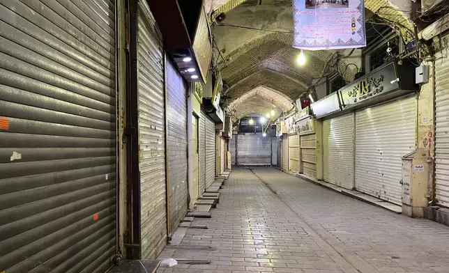 Shops are closed during protests in Tehran's centuries-old main bazaar, Iran, Tuesday, Jan. 6, 2026. (AP Photo/Vahid Salemi)