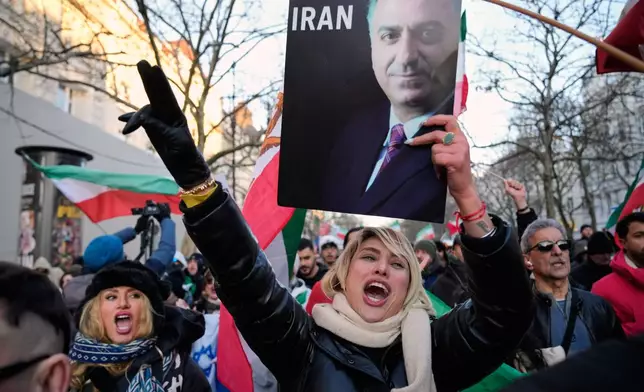 Protesters participate in a demonstration in Berlin, Germany, in support of the nationwide mass protests in Iran against the government, Saturday, Jan. 10, 2026. (AP Photo/Ebrahim Noroozi)