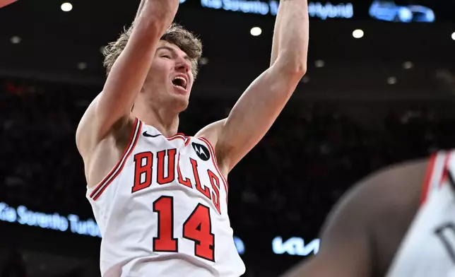 Chicago Bulls' Matas Buzelis dunks during the second half of an NBA basketball game against the New Orleans Pelicans, Wednesday, Dec. 31, 2025, in Chicago. (AP Photo/Paul Beaty)