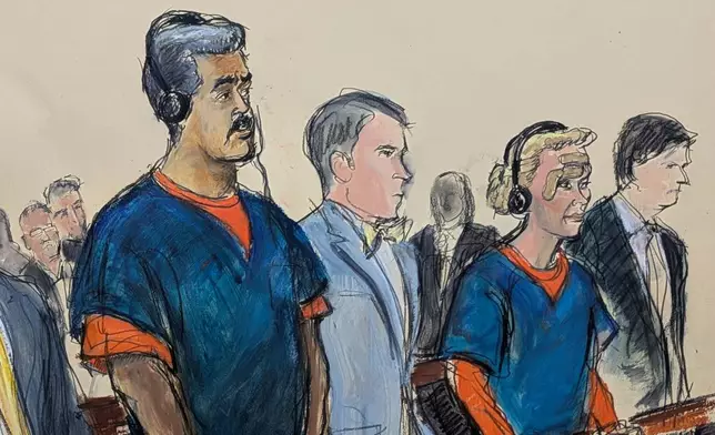 In this courtroom sketch, Venezuelan President Nicolas Maduro, left, and his wife, Cilia Flores, second from right, appear in Manhattan federal court with their defense attorneys Mark Donnelly, second from left, and Andres Sanchez, Monday, Jan. 5, 2026, in New York. (Elizabeth Williams via AP)