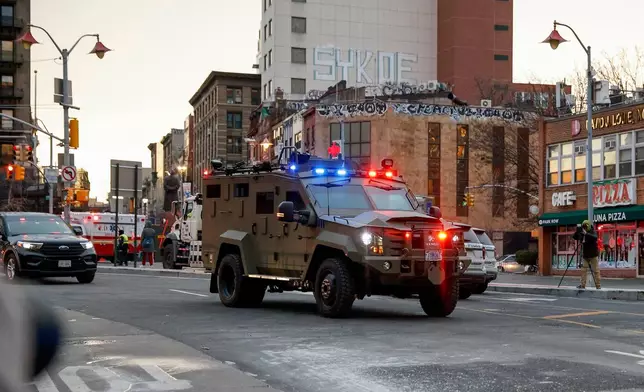 An armored vehicle carrying Venezuelan President Nicolas Maduro and his wife Cilia Flores arrives at Manhattan Federal Court, Monday, Jan. 5, 2026, in New York. (AP Photo/Stefan Jeremiah)