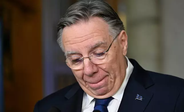 Quebec Premier Francois Legault announces his resignation during a news conference at his office in Quebec City, on Wednesday, Jan. 14, 2026. (Jacques Boissinot/The Canadian Press via AP)