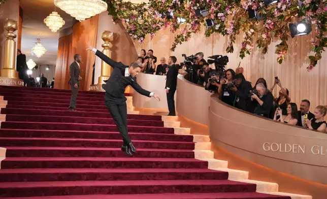 Derek Hough arrives at the 83rd Golden Globes on Sunday, Jan. 11, 2026, at the Beverly Hilton in Beverly Hills, Calif. (Photo by Jordan Strauss/Invision/AP)