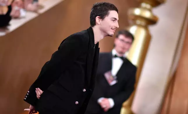 Timothee Chalamet arrives at the 83rd Golden Globes on Sunday, Jan. 11, 2026, at the Beverly Hilton in Beverly Hills, Calif. (Photo by Richard Shotwell/Invision/AP)