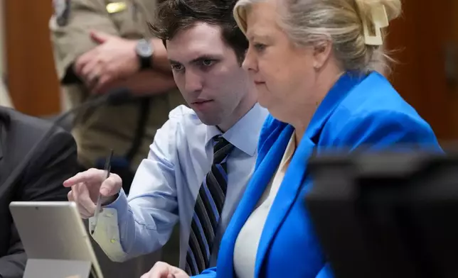 Tyler Robinson, accused in the fatal shooting of Charlie Kirk, sits beside defense attorney Kathryn Nester during a hearing in 4th District Court in Provo, Utah, on Friday, Jan. 16, 2026. (Bethany Baker/The Salt Lake Tribune via AP, Pool)