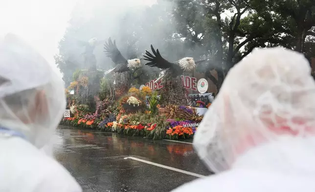 Rain comes down on a float at the 137th Rose Parade Thursday, Jan. 1, 2026, in Pasadena, Calif. (AP Photo/Caroline Brehman)