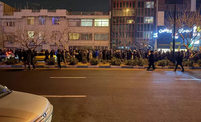 In this photo obtained by The Associated Press, Iranians attend an anti-government protest in Tehran, Iran, Thursday, Jan. 8, 2026.(UGC via AP)