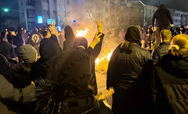 Iranians attend an anti-government protest in Tehran, Iran, Friday, Jan. 9, 2026. (AP Photo)