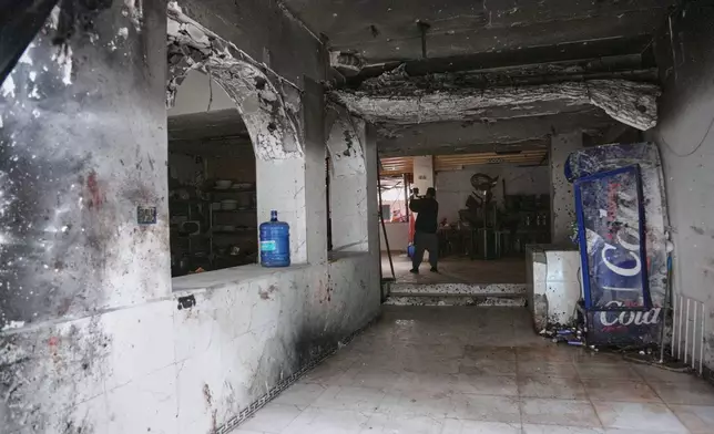 The interior of a Chinese restaurant is seen a day after an explosion killed at least seven people, including a Chinese national, in Kabul, Afghanistan, Tuesday, Jan. 20, 2026. (AP Photo/Siddiqullah Alizai)