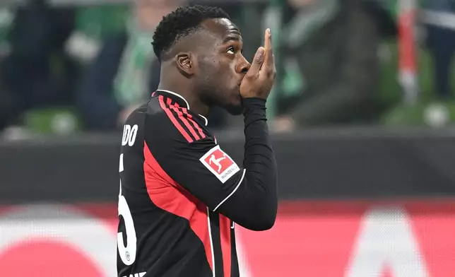 Frankfurt's Arnaud Kalimuendo-Muinga celebrates scoring during the Bundesliga soccer match between Werder Bremen and Eintracht Frankfurt in Bremen, Germany, Friday Jan. 16, 2026. (dpa via AP)