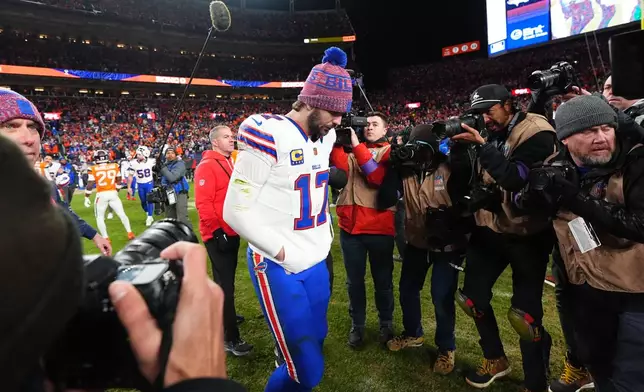 Buffalo Bills quarterback Josh Allen (17) leaves the field after an NFL divisional round playoff football game against the Denver Broncos, Saturday, Jan. 17, 2026, in Denver. (AP Photo/Jack Dempsey)