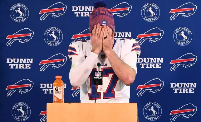 Buffalo Bills quarterback Josh Allen responds to questions during a news conference after an NFL divisional playoff game against the Denver Broncos, Saturday, Jan. 17, 2026, in Denver. (AP Photo/RJ Sangosti)