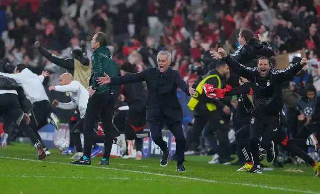 Benfica's head coach Jose Mourinho celebrates at the end of a Champions League opening phase soccer match between Benfica and Real Madrid, in Lisbon, Wednesday, Jan. 28, 2026. (AP Photo/Armando Franca)