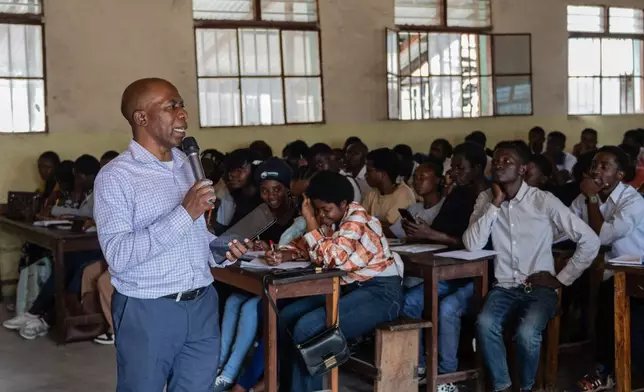 Deo Bengeya lectures students on economics in Goma, Democratic Republic of the Congo, Friday, Jan. 23, 2026, a year after M23 took control of the city. (AP Photo/Moses Sawasawa)
