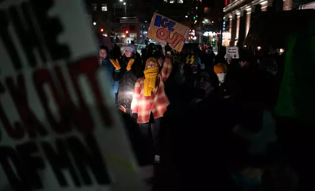 People participate in a protest and noise demonstration calling for an end to federal immigration enforcement operations in the city, Friday, Jan. 9, 2026, in Minneapolis. (AP Photo/John Locher)