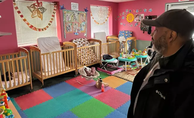 ABC Learning Center director Ahmed Hasin stands in the infant room at his daycare center in Minneapolis, Minn., on Wednesday, Dec. 31, 2025. (AP Photo/Mark Vancleave)