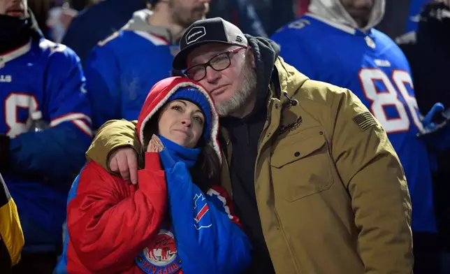 Fans watch a ceremony after the Buffalo Bills beat the New York Jets in the Bills' final regular-season NFL football home game in Highmark Stadium Sunday, Jan. 4, 2026, in Orchard Park, N.Y. (AP Photo/Adrian Kraus)