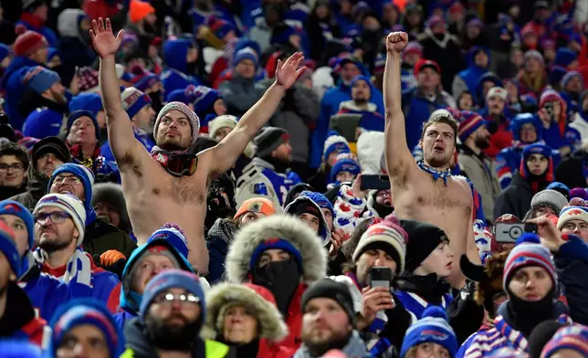Fans watch a ceremony after the Buffalo Bills beat the New York Jets in the Bills' final regular-season NFL football home game in Highmark Stadium Sunday, Jan. 4, 2026, in Orchard Park, N.Y. (AP Photo/Adrian Kraus)
