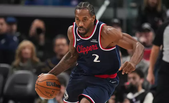 Los Angeles Clippers forward Kawhi Leonard (2) makes his way down the court during the first half of an NBA basketball game against the Golden State Warriors Monday, Jan. 5, 2026, in Inglewood, Calif. (AP Photo/Jae C. Hong)
