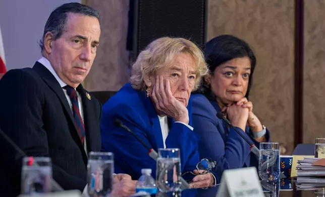 From left, Rep. Jamie Raskin, D-Md., Rep. Zoe Lofgren, D-Calif., and Rep. Pramila Jayapal, D-Wash., watch a video showing the storming of Capitol and the violent attack on Capitol Police officers as House Democrats hold an unofficial hearing on the 5th anniversary of the Jan. 6, 2021, riot by supporters of President Donald Trump, at the Capitol in Washington, Tuesday, Jan. 6, 2026. (AP Photo/J. Scott Applewhite)