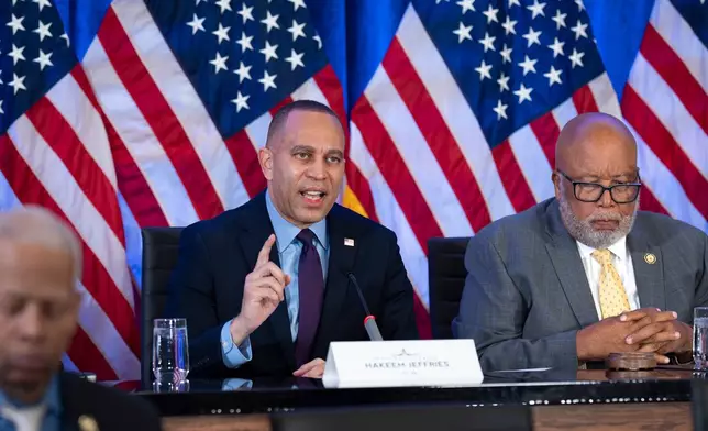 House Minority Leader Hakeem Jeffries, D-N.Y., left, and Rep. Bennie Thompson, D-Miss., the former chairman of the January 6th Select Committee, and other House Democrats hold an unofficial hearing on the 5th anniversary of the Jan. 6, 2021, riot by supporters of President Donald Trump who stormed into the U.S. Capitol to interrupt the certification of Democrat Joe Biden's election victory, at the Capitol in Washington, Tuesday, Jan. 6, 2026. (AP Photo/J. Scott Applewhite)