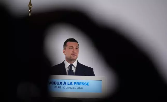 Far-right party National Rally president Jordan Bardella speaks during his New Year address to the press, Monday, Jan. 12, 2026 in Paris. (AP Photo/Christophe Ena)