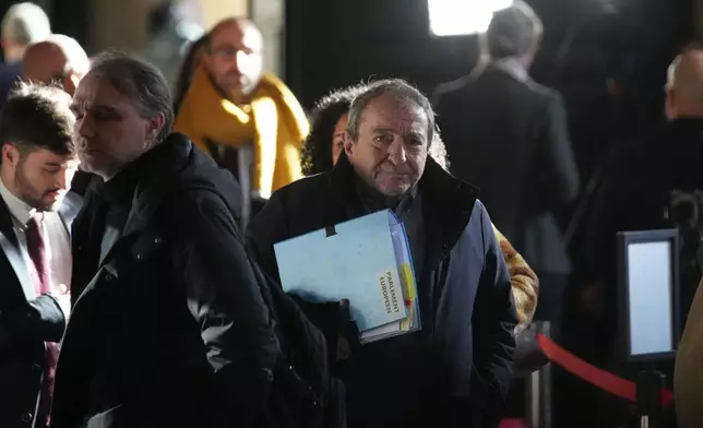 European Parliament lawyer Patrick Maisonneuve arrives to an appeal court for far-right leader Marine Le Pen's appeal trial for an embezzlement conviction, Tuesday, Jan. 13, 2026 in Paris. (AP Photo/Christophe Ena)