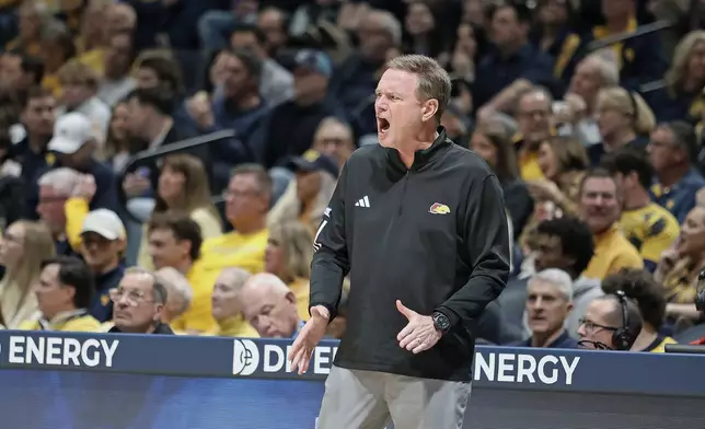 Kansas coach Bill Self reacts during the first half of an NCAA college basketball game against West Virginia Saturday, Jan. 10, 2026, in Morgantown, W.Va. (AP Photo/Kathleen Batten)