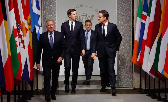 Jared Kushner, second left, US Special Envoy Steve Witkoff, left, and NATO Secretary General Mark Rutte, right, arrive for a meeting of the Coalition of the Willing at the Elysee Palace in Paris, France, Tuesday, Jan.6, 2026. (Yoan Valat, Pool photo via AP)